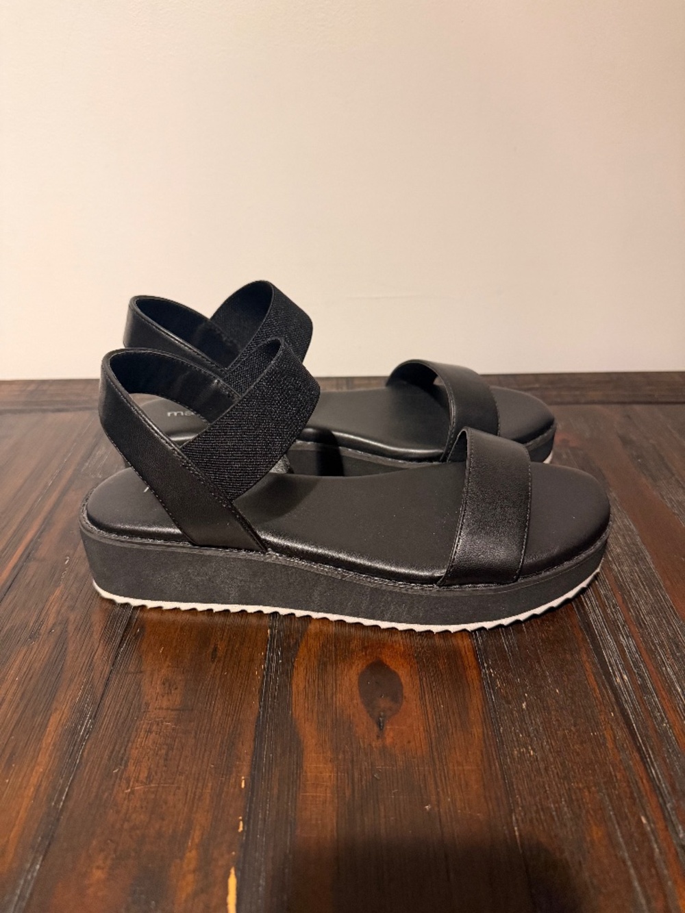 Black Maurice’s sandals
